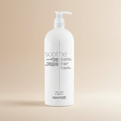 White bottle of Caronlab soothe after wax lotion on a white background