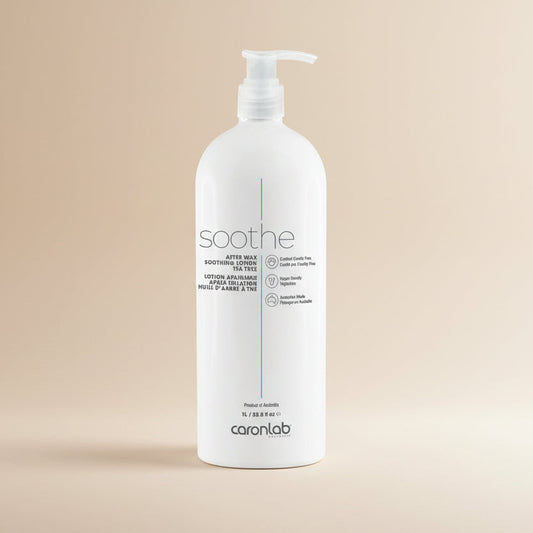 White bottle of Caronlab soothe after wax lotion on a white background