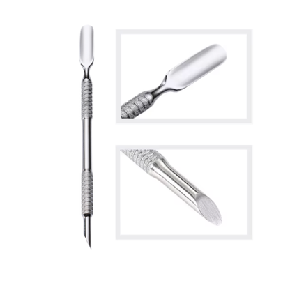 Stainless steel cuticle cuticle pusher with textured handle and pointed end on a white background