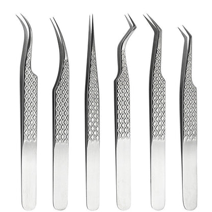 Set of six pairs of stainless steel eyelash extension tweezers on a white background