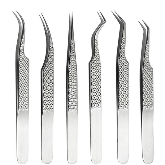 Set of six pairs of stainless steel eyelash extension tweezers on a white background